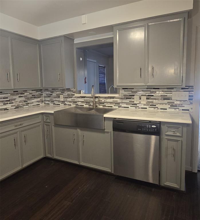 2018 Van Cleave Drive Dallas, TX 75216 - Photo 6 of 12 a kitchen with a sink and cabinets