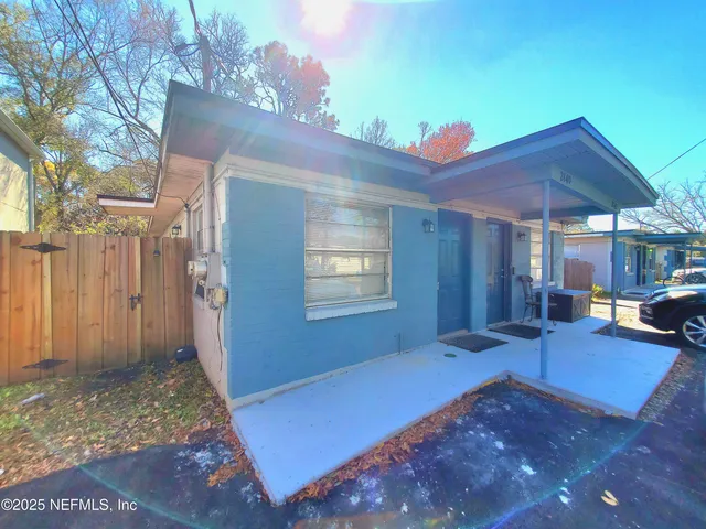 a backyard of a house with seating space