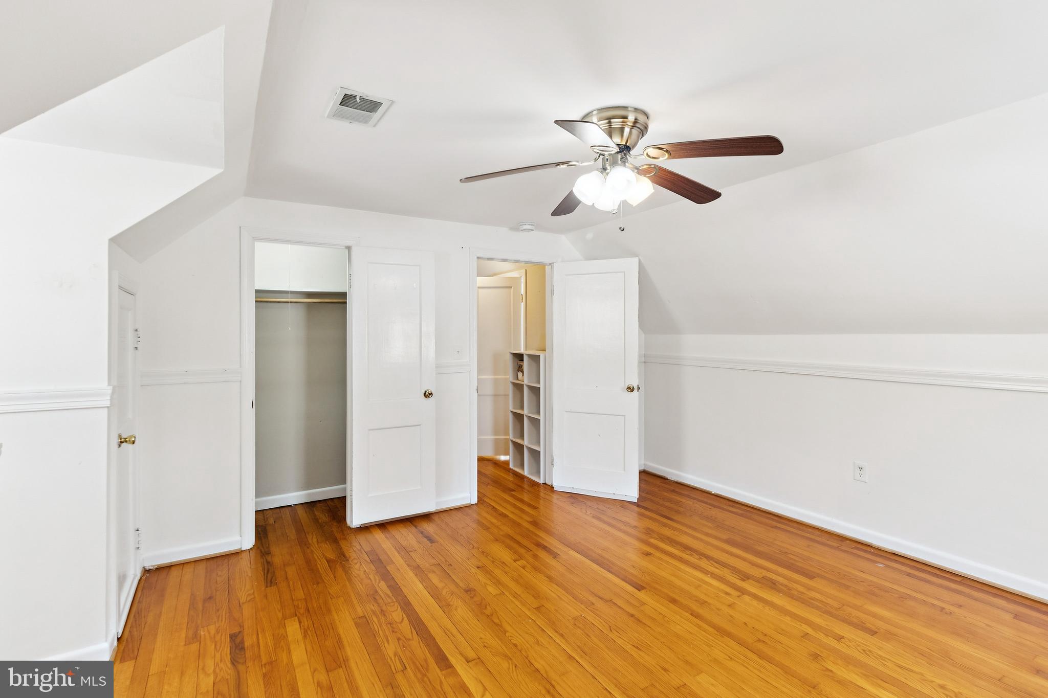 305 Cedar Ridge Drive Oxon Hill, MD 20745 - Photo 11 of 22 a view of empty room with wooden floor