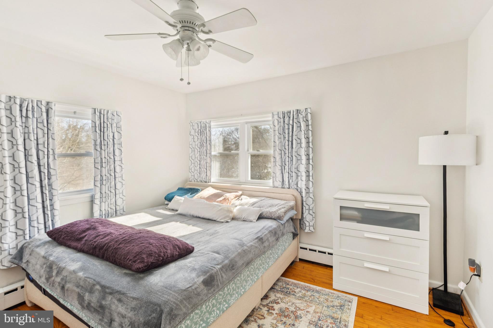 305 Cedar Ridge Drive Oxon Hill, MD 20745 - Photo 15 of 22 a bedroom with a bed and a window with the outer view