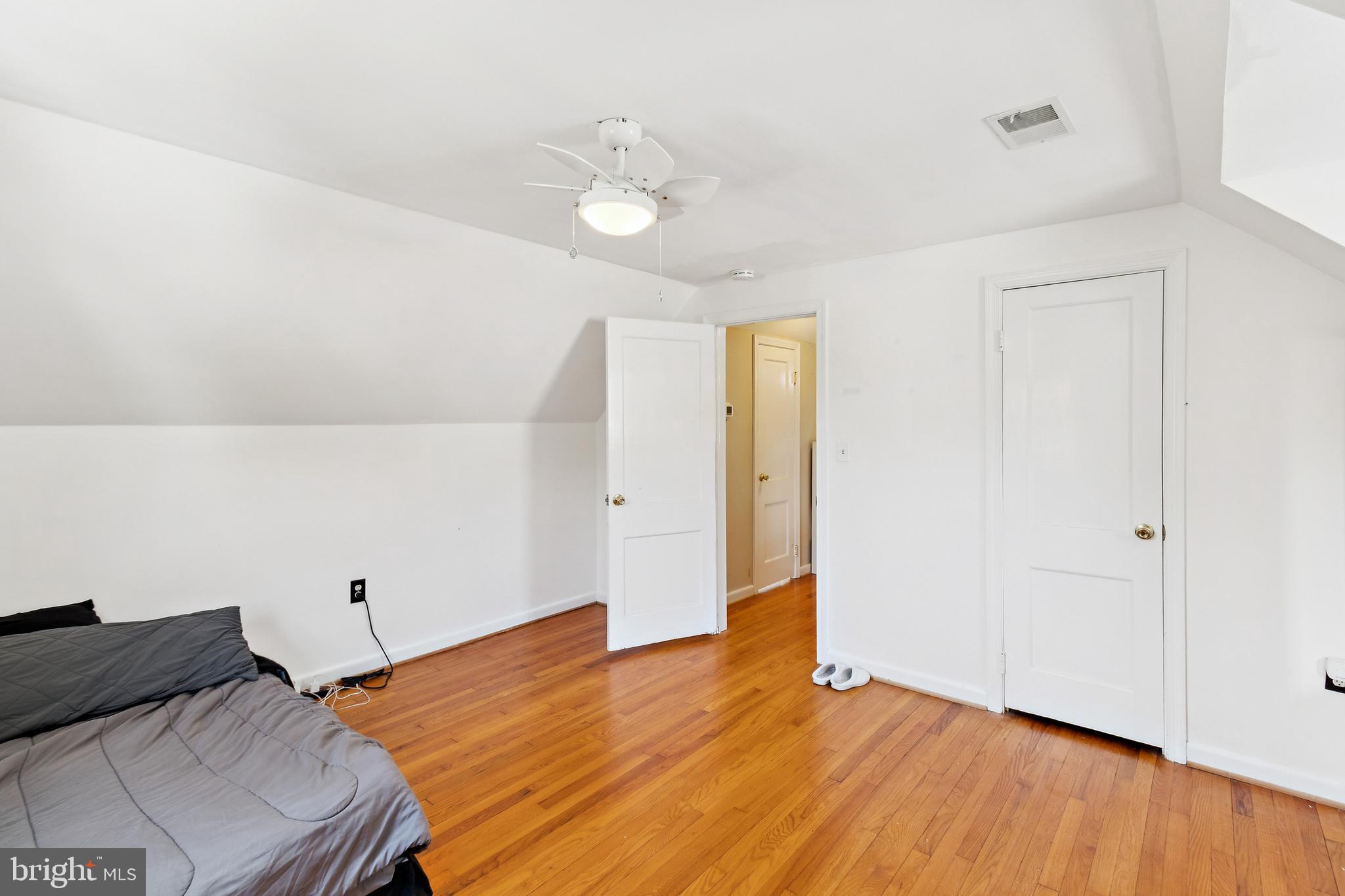 305 Cedar Ridge Drive Oxon Hill, MD 20745 - Photo 10 of 22 wooden floor in an empty room