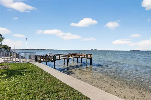 a view of a swimming pool with a terrace