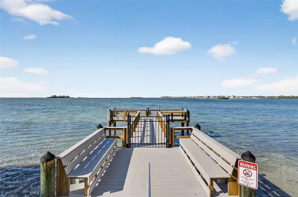 a view of wooden floor with a lake view