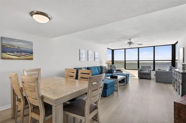 a view of a dining room with furniture window and outside view