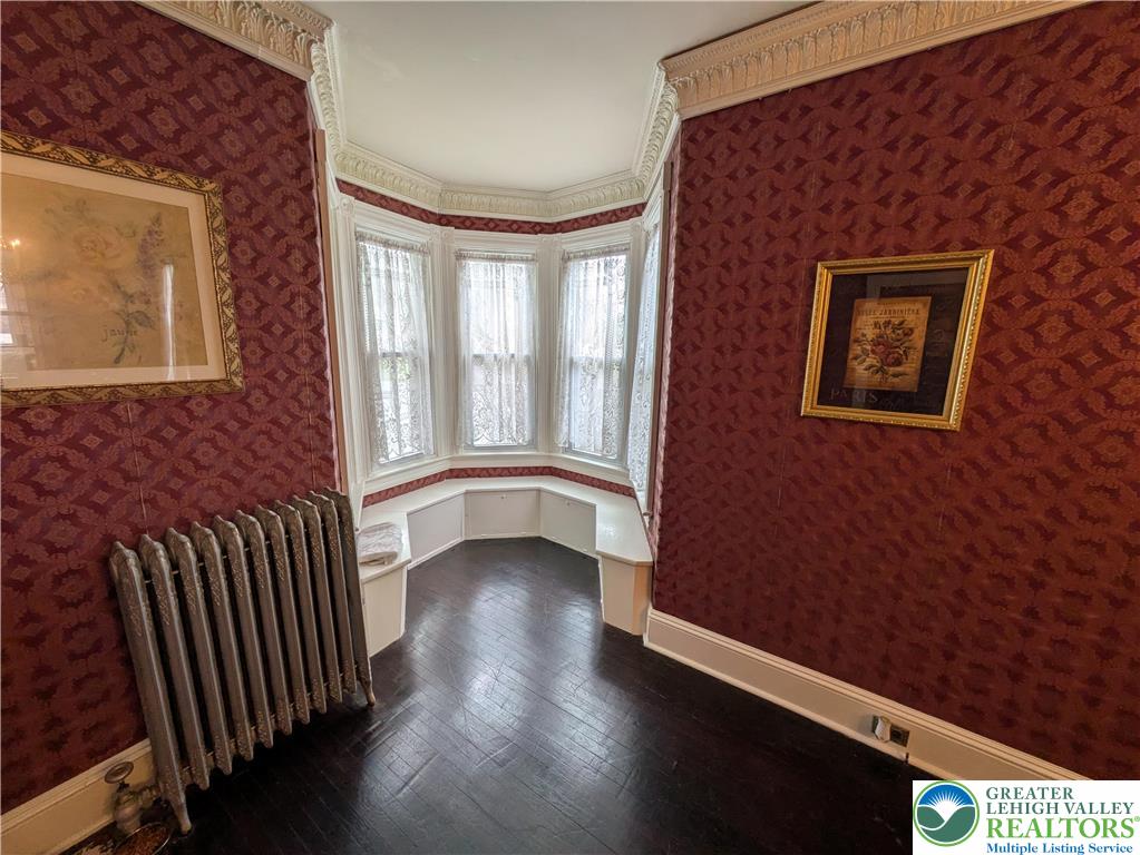 6423 Front Street Bangor, PA 18013 - Photo 25 of 60 a view of an empty room with wooden floor and a window