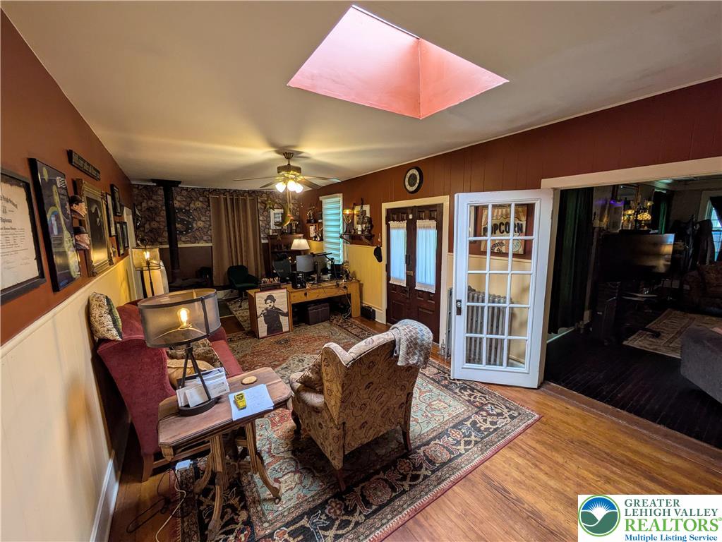 6423 Front Street Bangor, PA 18013 - Photo 4 of 60 a living room with furniture a lamp and a table