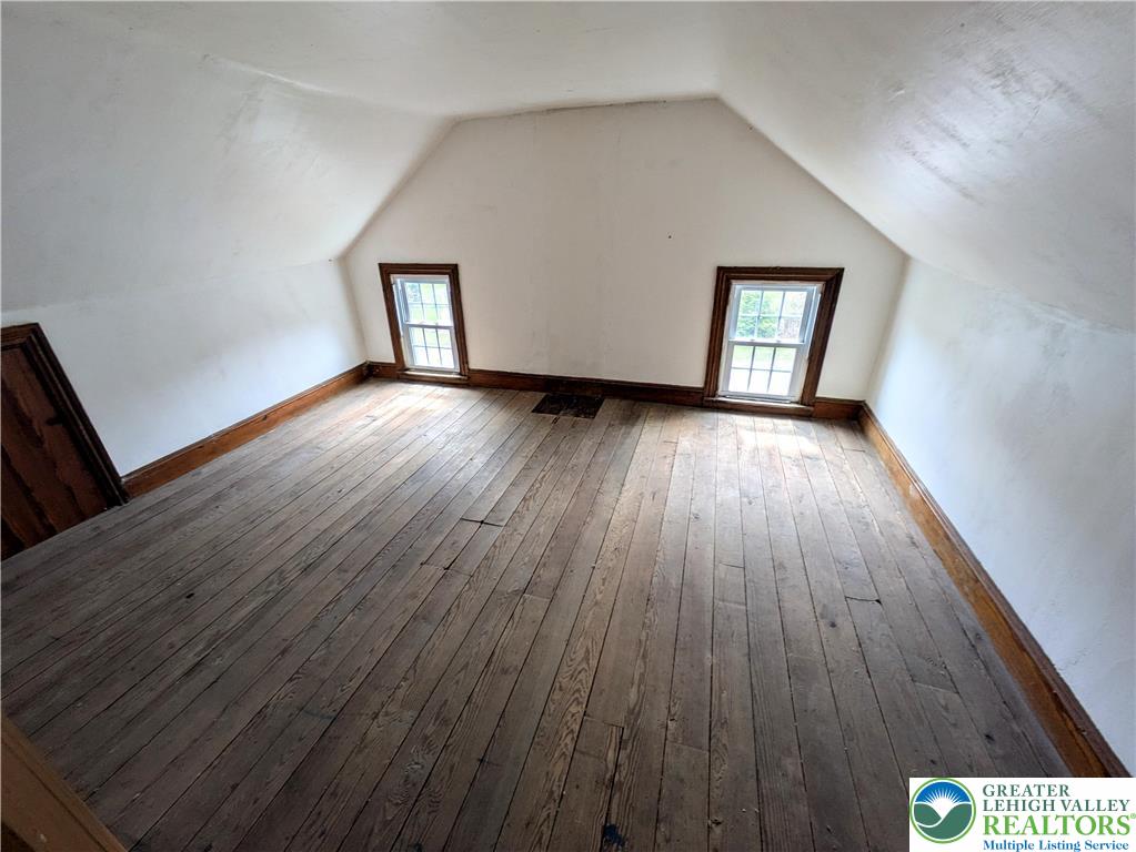 6423 Front Street Bangor, PA 18013 - Photo 44 of 60 an empty room with wooden floor and windows
