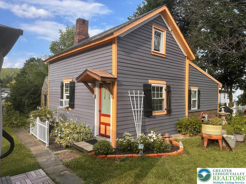 6423 Front Street Bangor, PA 18013 - Photo 48 of 60 a front view of a house with a yard