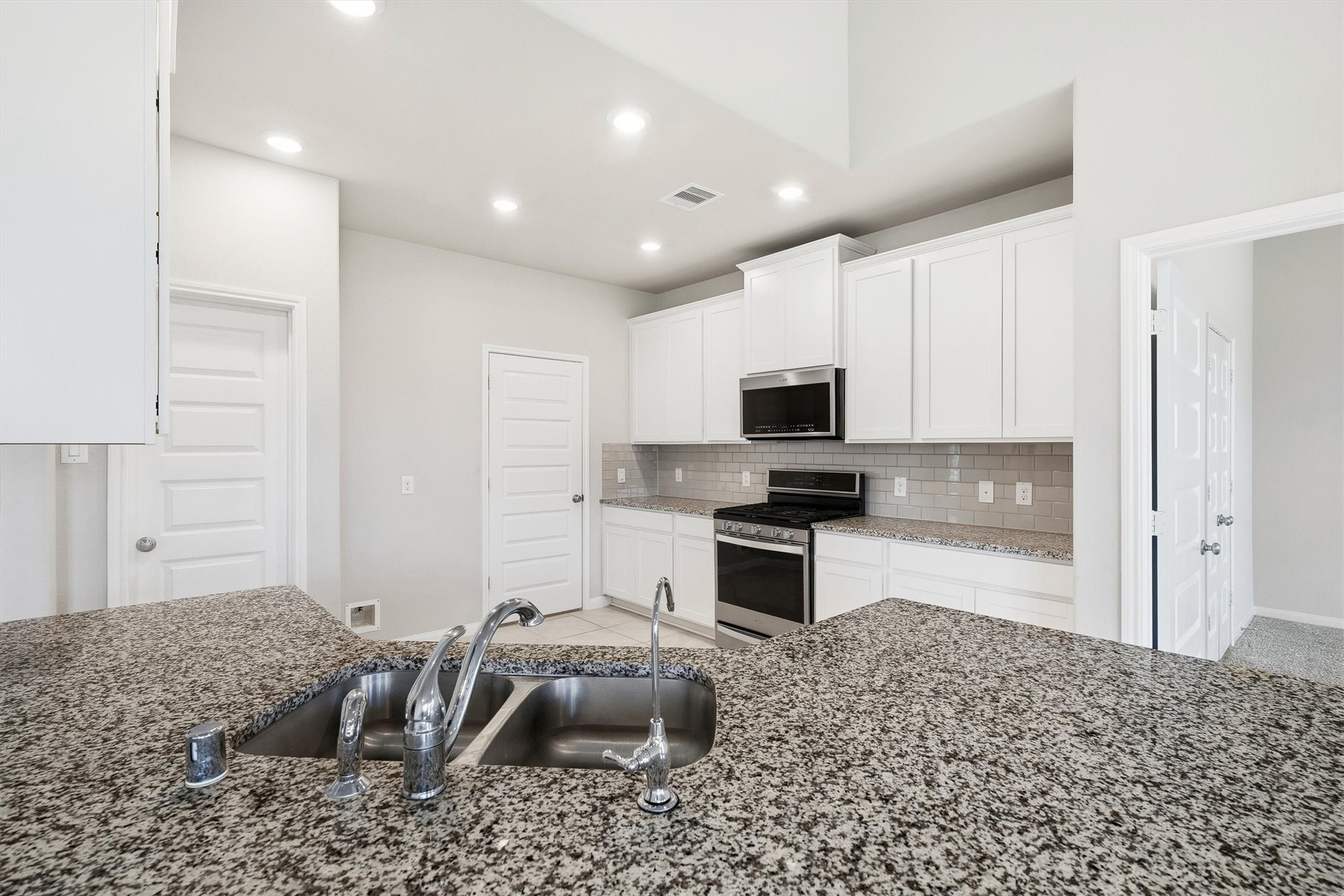 2413 Olancha Drive Rosharon, TX 77583 - Photo 12 of 41 Recess lights, undermount sink, a kitchen well cared for