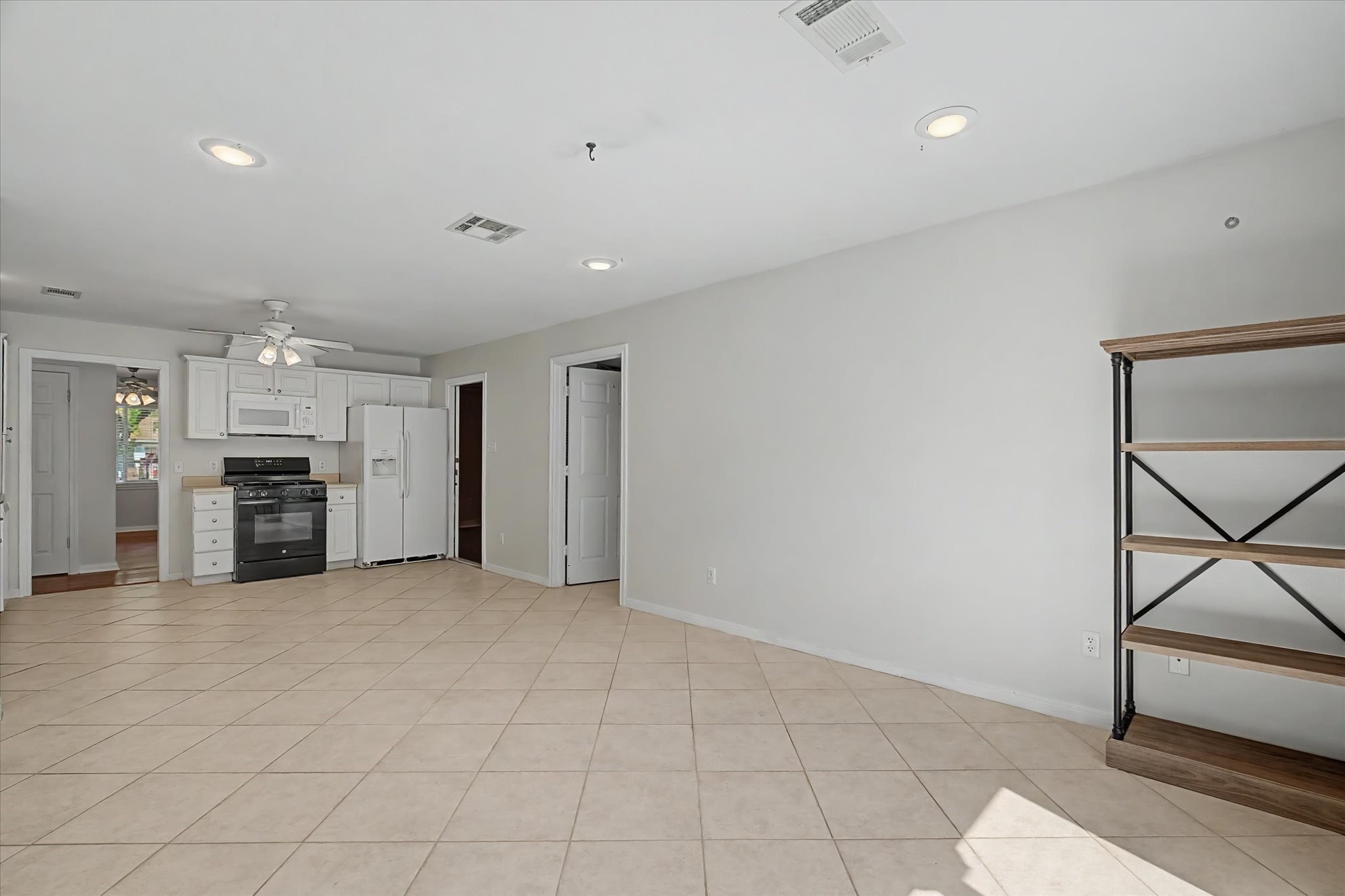 413 Farrer Street Angleton, TX 77515 - Photo 16 of 43 a view of a kitchen with furniture and a sink