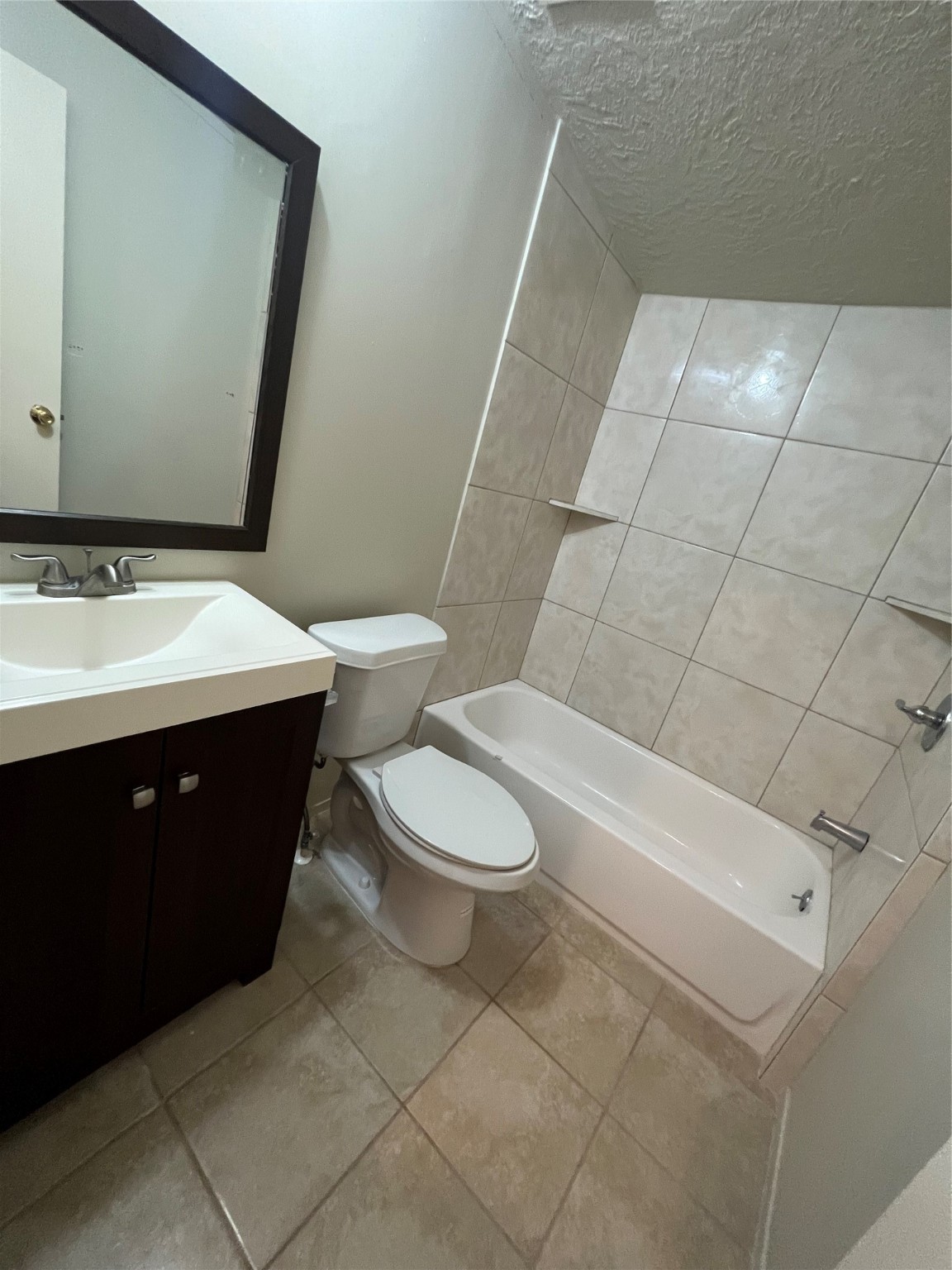 20431 Mountaindale Drive Cypress, TX 77433 - Photo 12 of 17 a bathroom with a sink a toilet and mirror