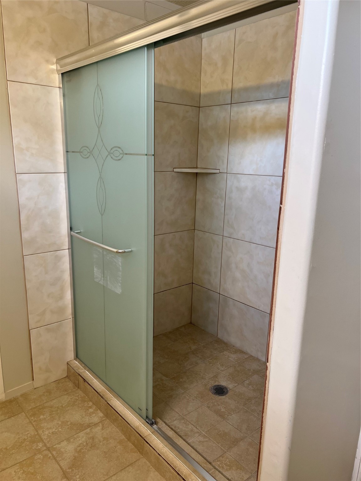 20431 Mountaindale Drive Cypress, TX 77433 - Photo 6 of 17 a bathroom with a glass door shower