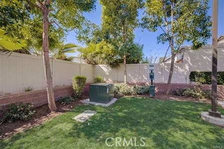713 South Azusa Avenue, Unit A Azusa, CA 91702 - Photo 19 of 24 a view of a backyard with plants and a barbeque