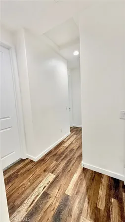 a view of room and wooden floor