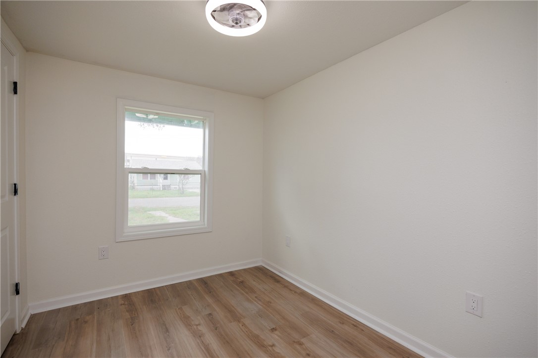 306 Allison Drive Gregory, TX 78359 - Photo 12 of 27 an empty room with a window