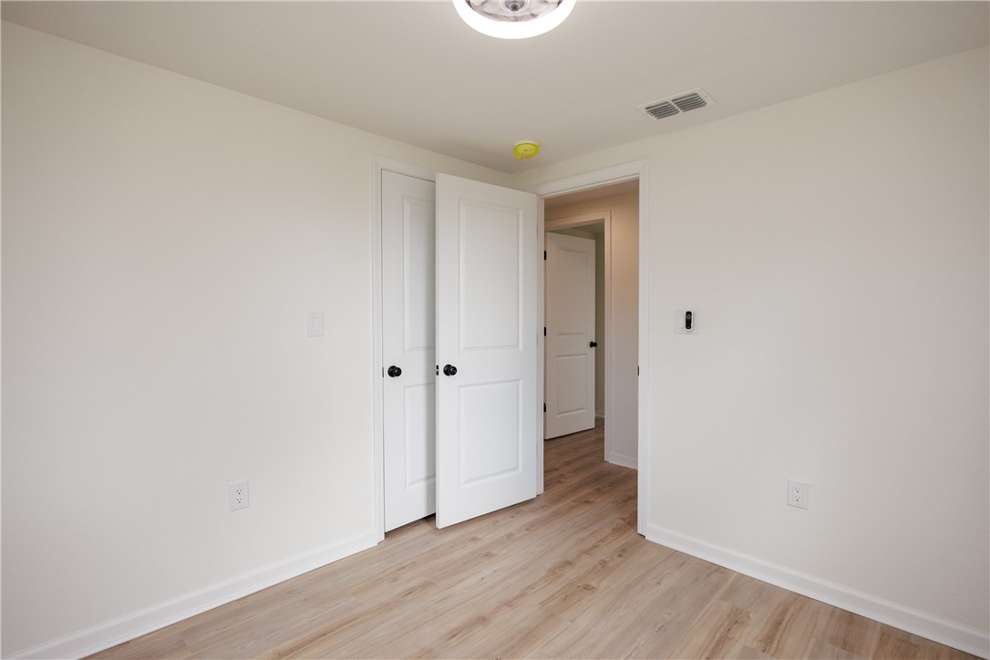 306 Allison Drive Gregory, TX 78359 - Photo 17 of 27 a view of hallway with wooden floor