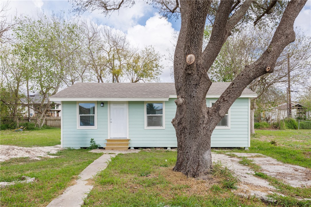 306 Allison Drive Gregory, TX 78359 - Photo 2 of 27 a view of a house with backyard and garden