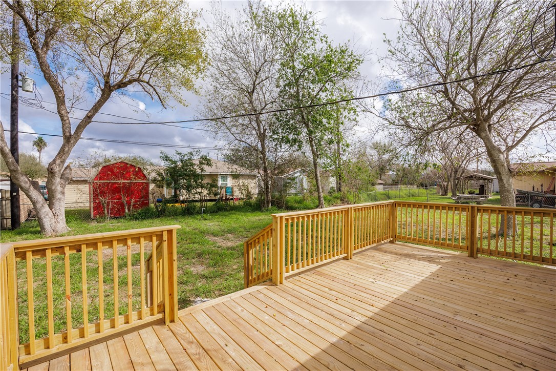 306 Allison Drive Gregory, TX 78359 - Photo 22 of 27 a view of balcony with wooden floor and fence