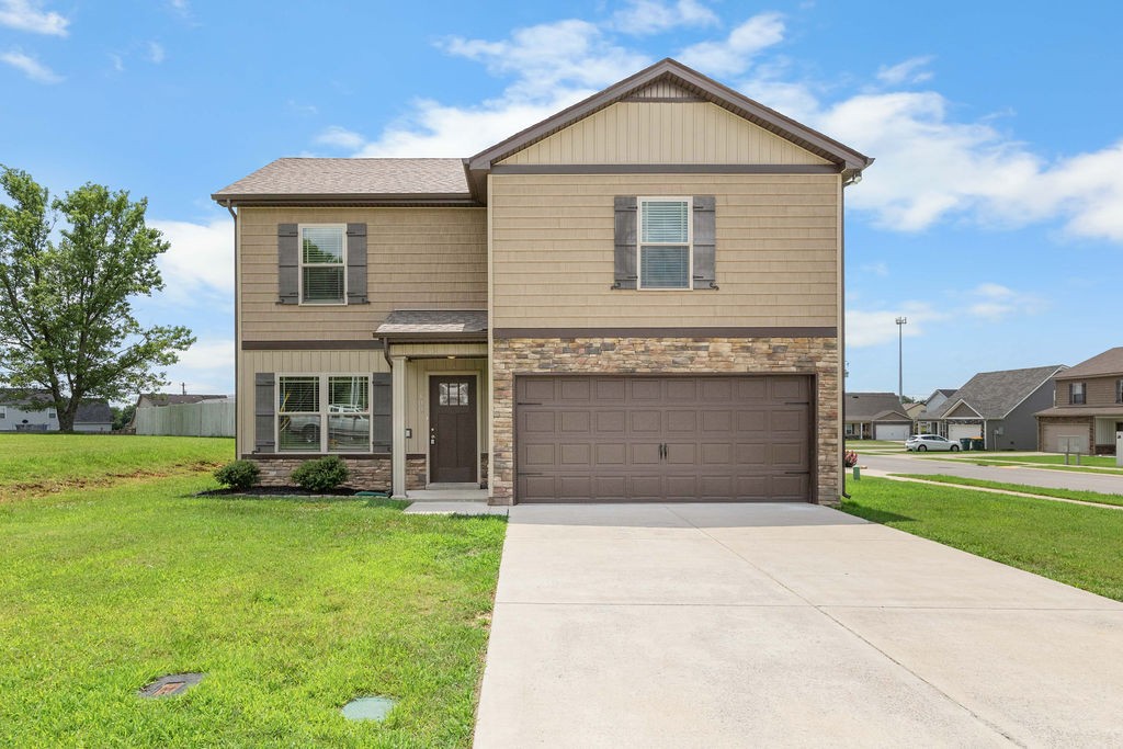 408 Brigade Court Lebanon, TN 37087 - Photo 1 of 36 a front view of house with yard and green space