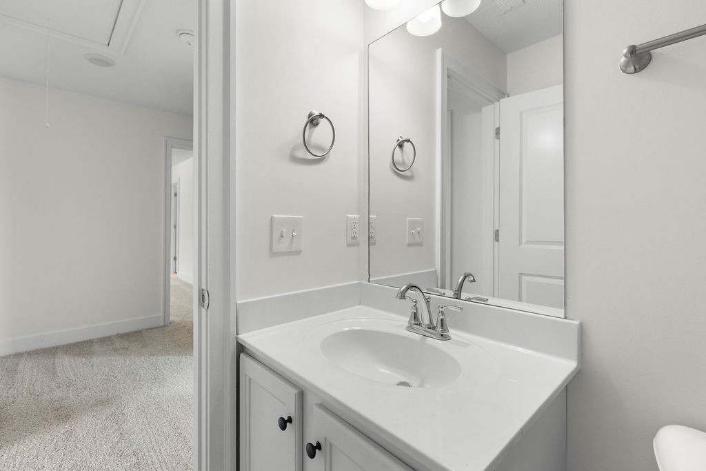 408 Brigade Court Lebanon, TN 37087 - Photo 30 of 36 a bathroom with a sink and a mirror