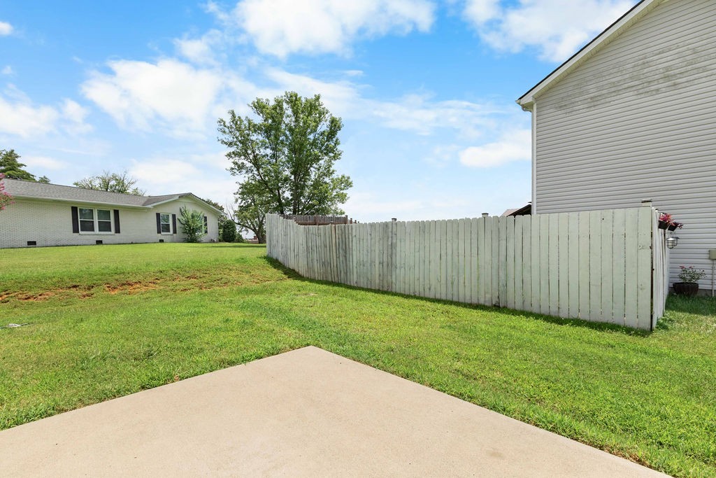 408 Brigade Court Lebanon, TN 37087 - Photo 31 of 36 a view of a backyard with a garden