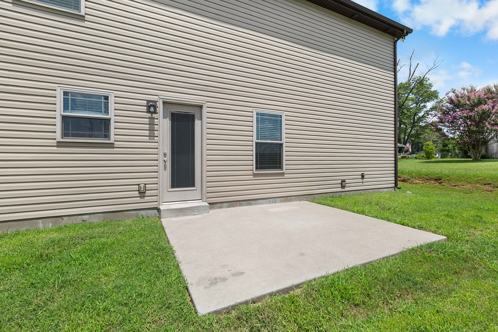 408 Brigade Court Lebanon, TN 37087 - Photo 32 of 36 a view of a white house next to a yard and large trees
