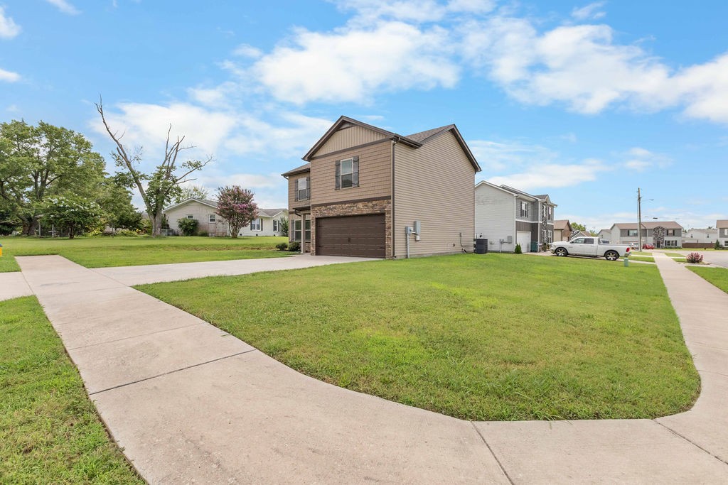 408 Brigade Court Lebanon, TN 37087 - Photo 35 of 36 a view of a house with a backyard
