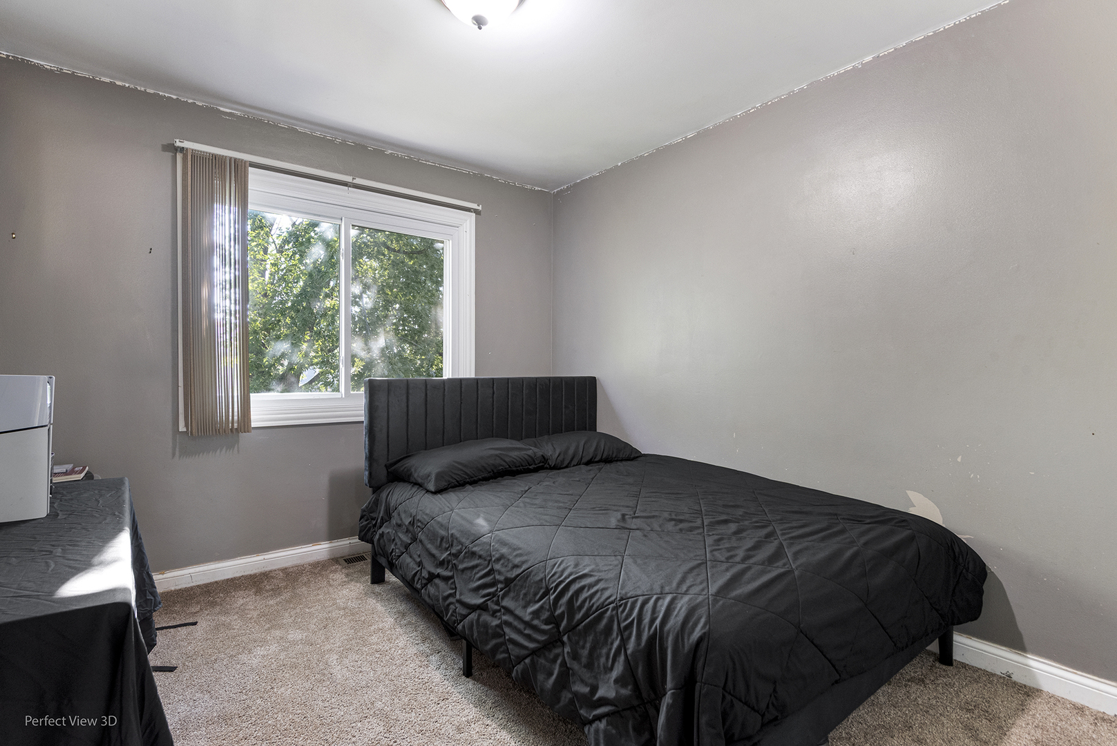 217 Oriole Road Matteson, IL 60443 - Photo 18 of 22 a bedroom with a bed and a window