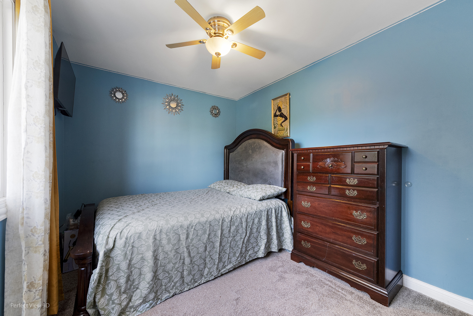 217 Oriole Road Matteson, IL 60443 - Photo 19 of 22 a bedroom with a bed a chandelier and a dresser
