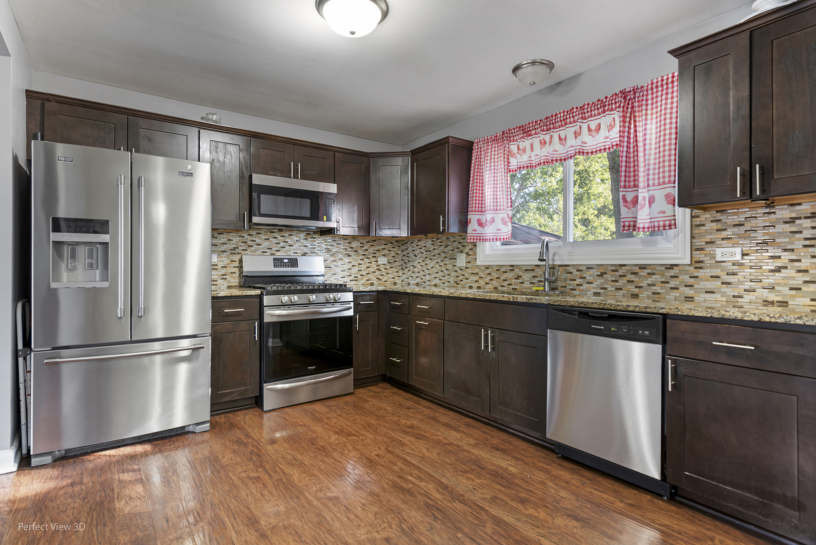 217 Oriole Road Matteson, IL 60443 - Photo 2 of 22 a kitchen with stainless steel appliances granite countertop a refrigerator a sink dishwasher a stove with wooden cabinets and floor