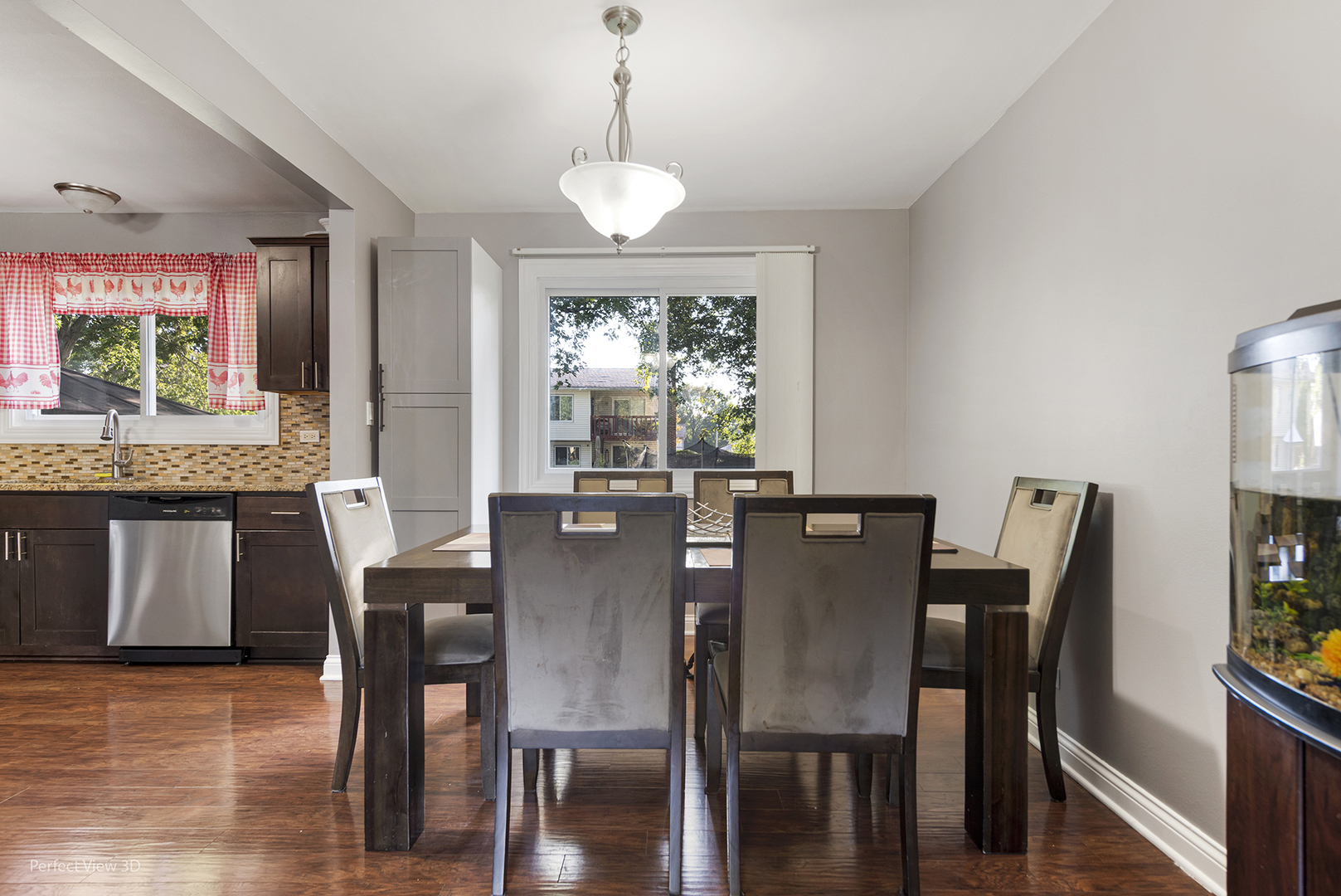 217 Oriole Road Matteson, IL 60443 - Photo 4 of 22 a view of a dining room with furniture window and wooden floor