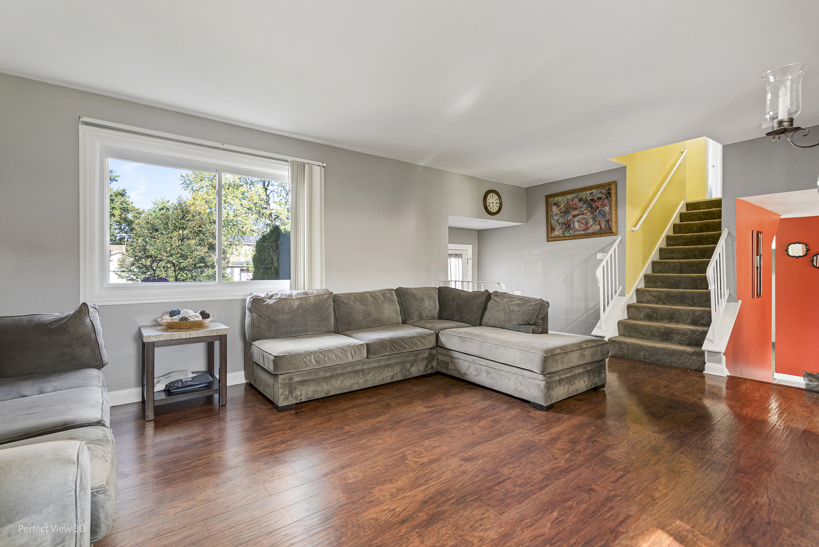 217 Oriole Road Matteson, IL 60443 - Photo 6 of 22 a living room with furniture and a wooden floor