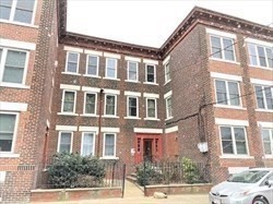 a front view of a multi story building