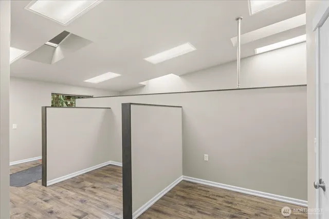 a kitchen with sink and cabinets