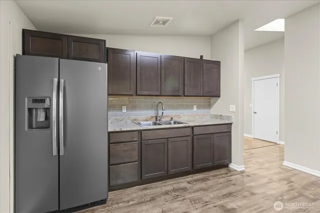a view of wooden floor in an empty room