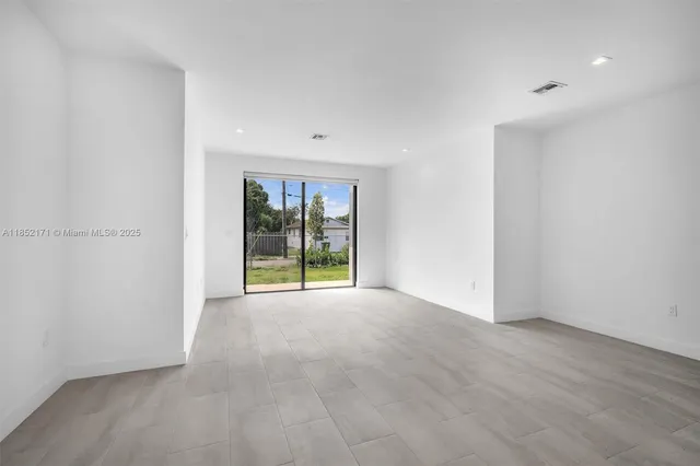 a view of a kitchen with a sink