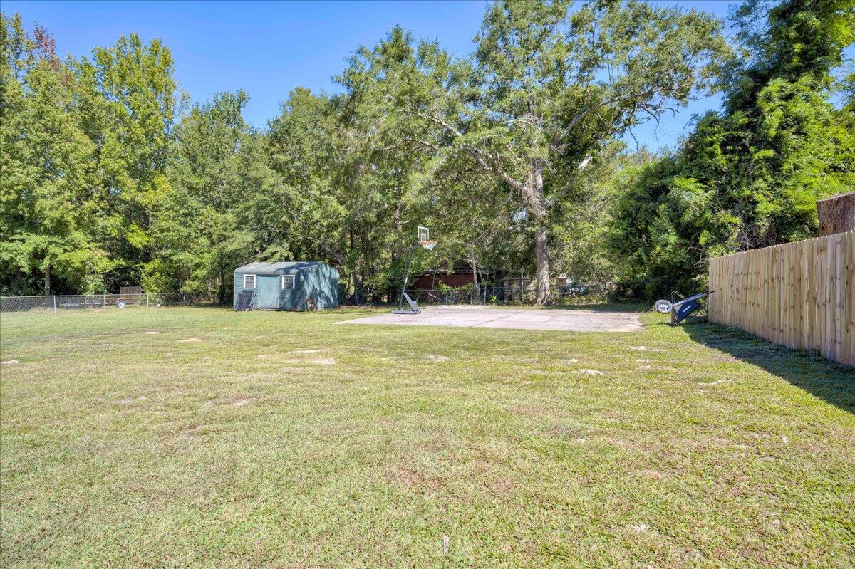 102 Peachtree Street Wrens, GA 30833 - Photo 33 of 38 Spacious backyard for a garden, activities etc!