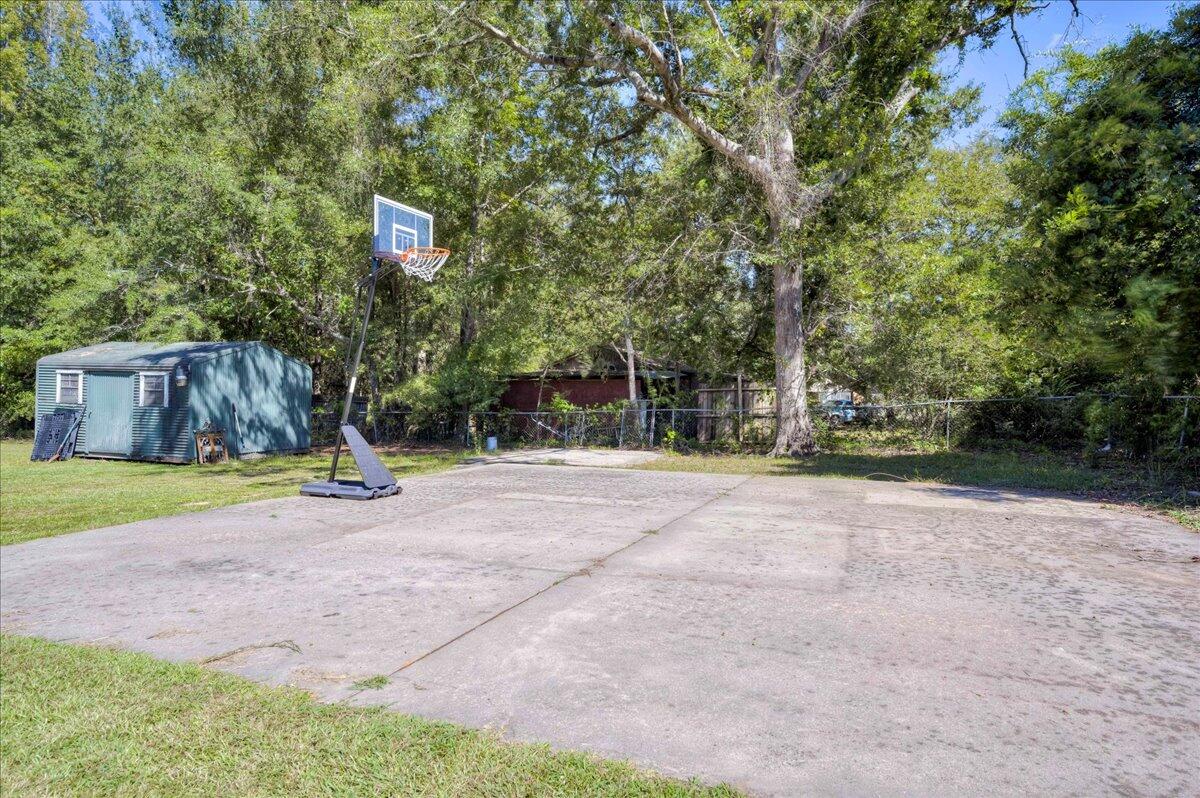 102 Peachtree Street Wrens, GA 30833 - Photo 34 of 38 Basketball goal does NOT remain. Concrete pad is great for other uses!
