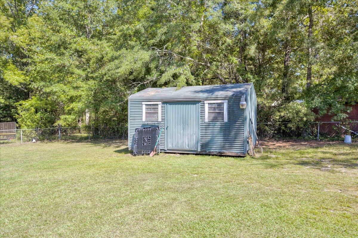 102 Peachtree Street Wrens, GA 30833 - Photo 35 of 38 Detached green building stays in 'as-is' condition!