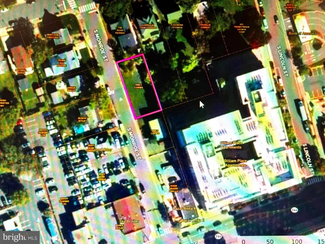 a picture of a room with a refrigerator