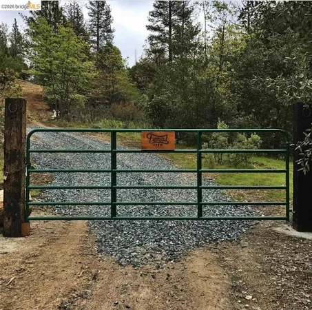 a view of a wooden fence