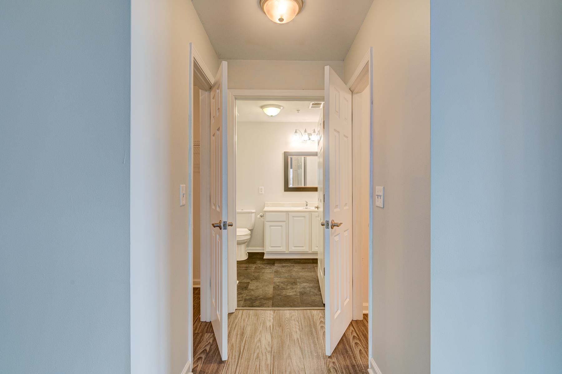 4826 Innisbrook Court, Unit 905 Myrtle Beach, SC 29579 - Photo 18 of 36 Hallway featuring wood finished floors and baseboards