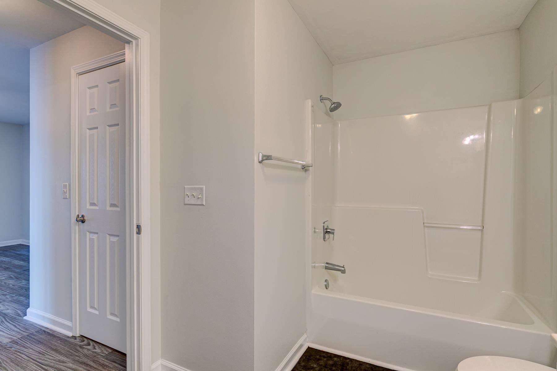 4826 Innisbrook Court, Unit 905 Myrtle Beach, SC 29579 - Photo 20 of 36 Bathroom featuring shower combination and baseboards