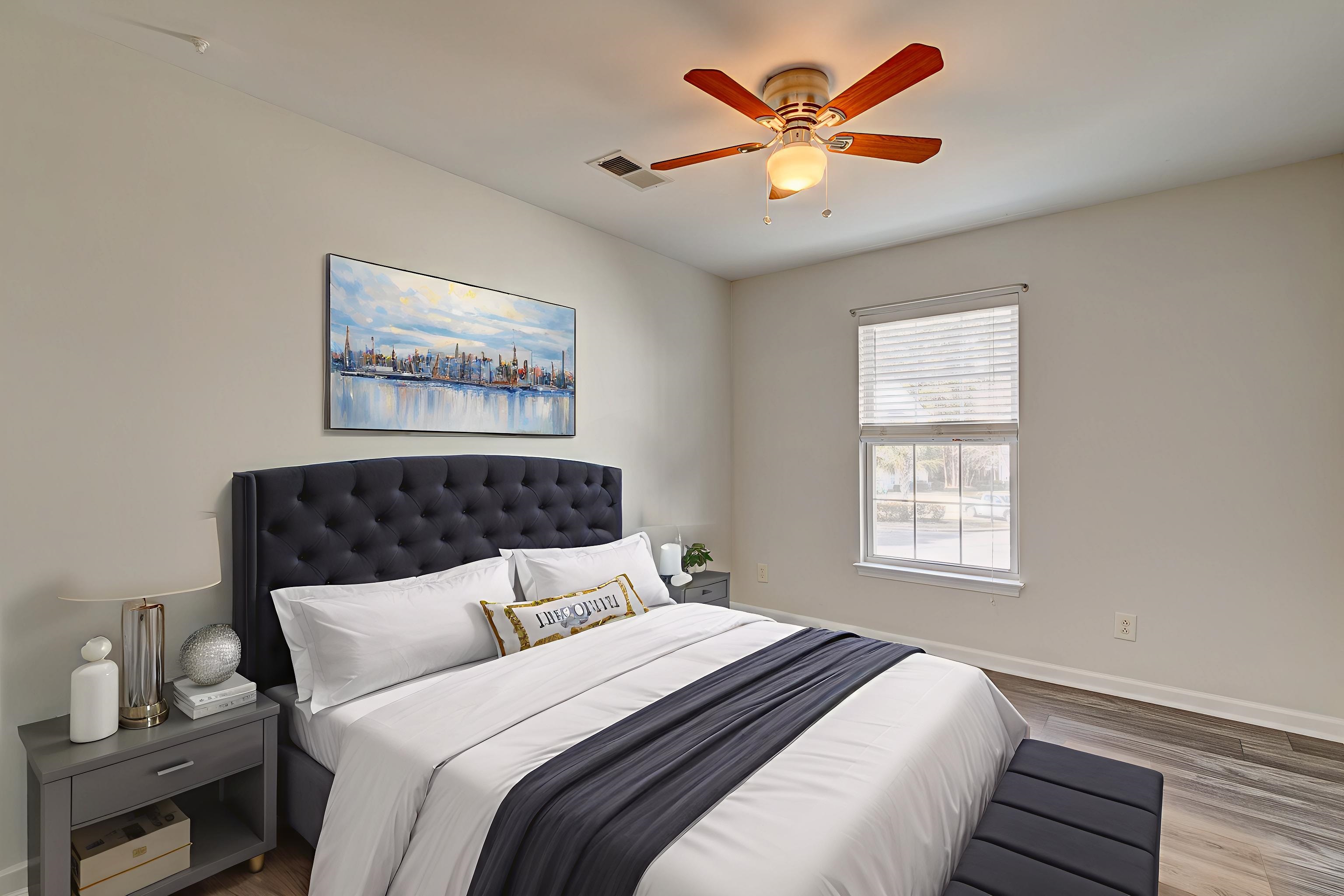 4826 Innisbrook Court, Unit 905 Myrtle Beach, SC 29579 - Photo 26 of 36 Bedroom featuring wood finished floors and a ceiling fan