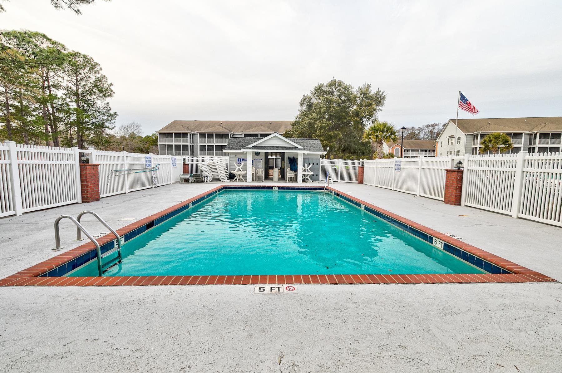 4826 Innisbrook Court, Unit 905 Myrtle Beach, SC 29579 - Photo 35 of 36 Community pool featuring a patio area