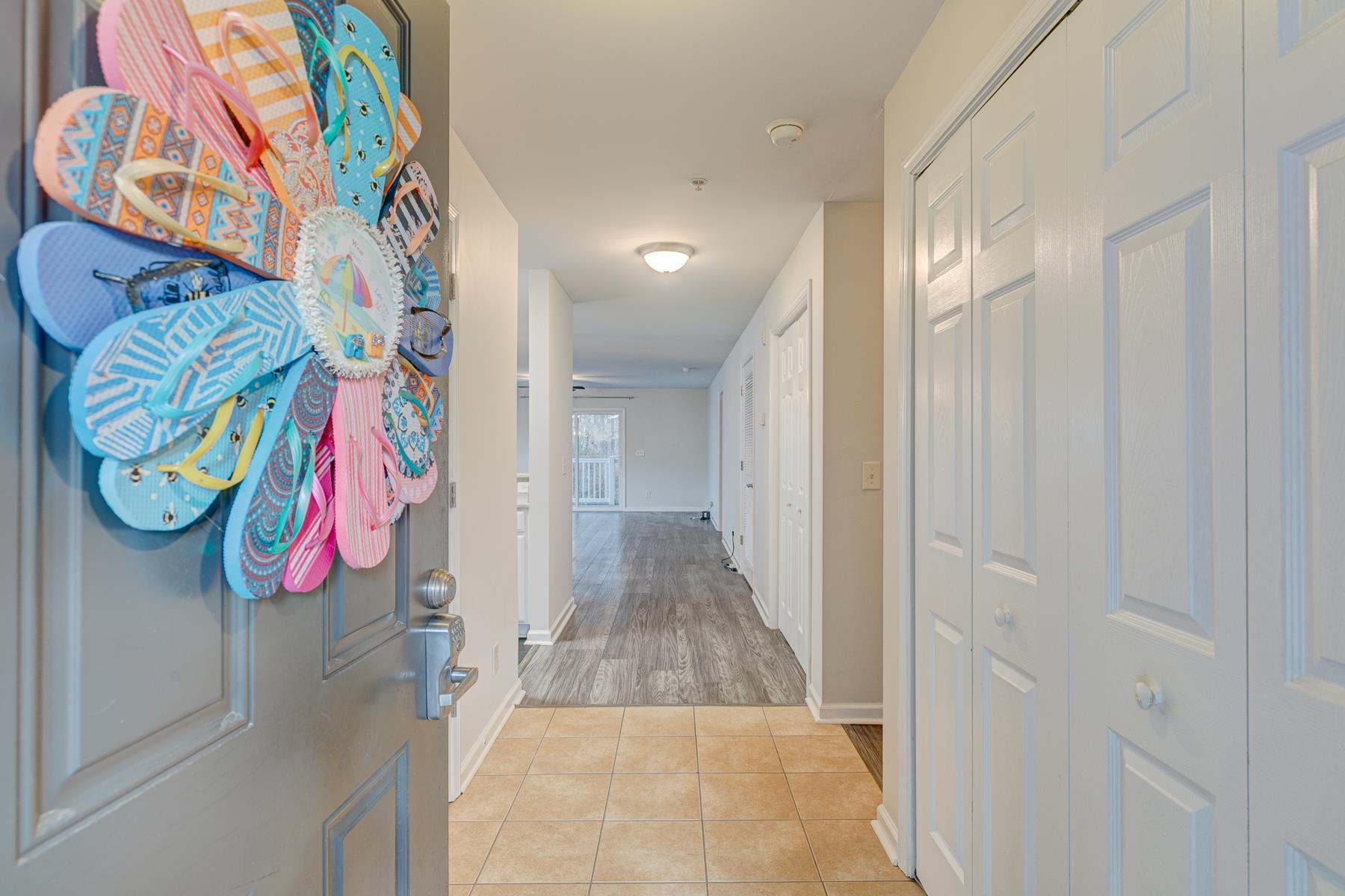 4826 Innisbrook Court, Unit 905 Myrtle Beach, SC 29579 - Photo 4 of 36 Corridor with baseboards and light tile patterned flooring