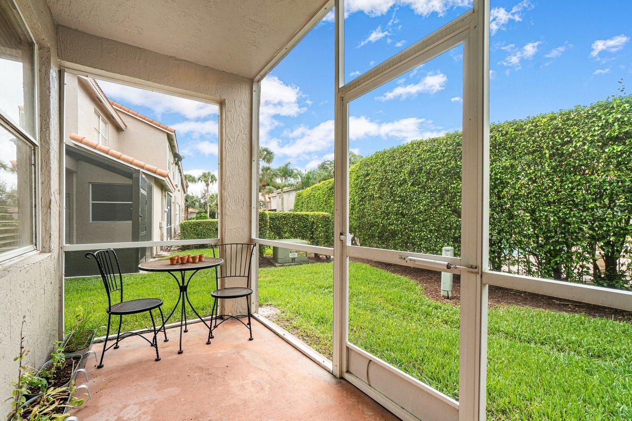 20931 Vía Azalea, Unit 4 Boca Raton, FL 33428 - Photo 25 of 45 Enclosed Patio