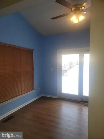 a bathroom with a toilet sink and shower