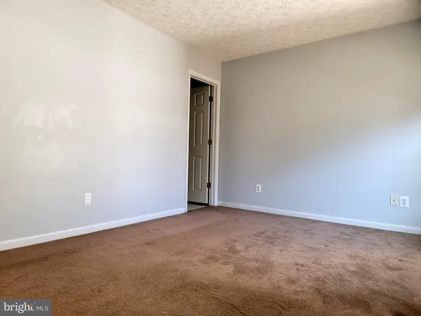 a view of a room with lots of storage and utility room