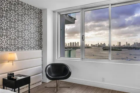 a kitchen with a granite countertop window and a sink